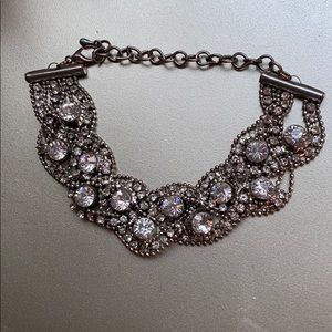 Silver bracket with rhinestones